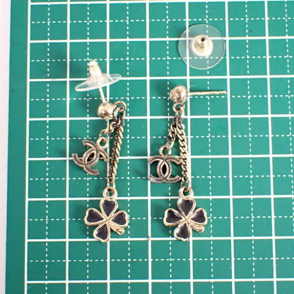 CHANEL Authentic Gold Logo Earrings